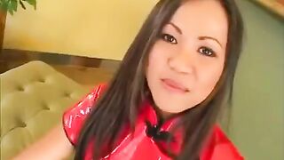 A Korean beauty gives a blowjob to two guys in an intense scene
