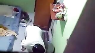 Camera hidden in the female hostel room for peeping