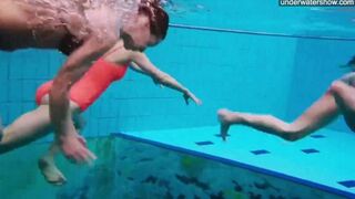 Nude girls in the pool captured by a hidden camera in erotic shots