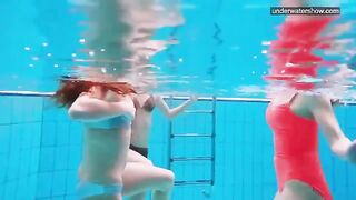 Nude girls in the pool captured by a hidden camera in erotic shots