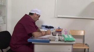 The doctor used a special tool to expand the girl's pussy in the hospital