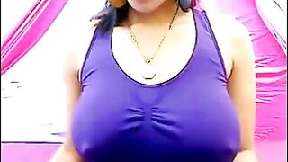 Her nipples are standing out through her t-shirt with excitement