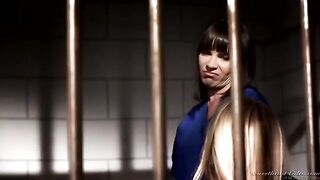 Two girls are having fun without guys in a prison cell