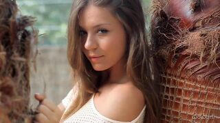 A beautiful young Russian girl is stripping erotic dance