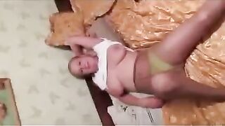 A pregnant woman was leaking milk in front of a photographer