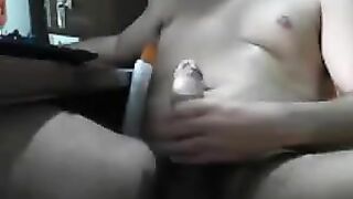 The guy is jerking off in front of a girl driving and she's giving him a handjob