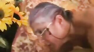 A man fucked a gray-haired woman in black stockings, a steamy scene