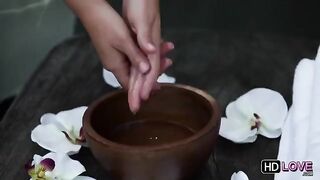 A hot guy massaged the body of a sexy brunette