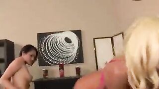 The girl in a skirt seduces her girlfriend and grinds with toys