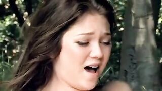 Two lesbians are having fun outdoors in the park during a picnic