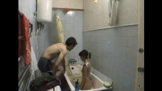 A girl has sex with her brother in the bathroom, hidden camera captures