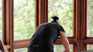Vietnamese beauty fucked in the kitchen by her boyfriend with a strap-on