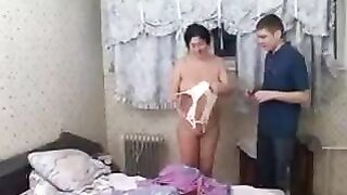 The young guy has sex with his aged mother