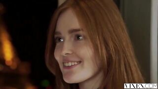 The guy thoroughly licked the red-haired girl's cap