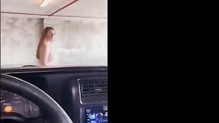 Redhead babe gets fucked in public garage with no roof