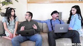 A couple of cute girls threw a surprise party for their stepfather on the couch