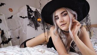 A cute witch waits for the magic of sex on Halloween, just like in a spell