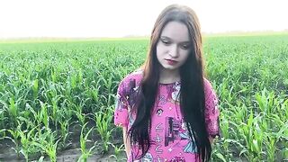 A sexual chick is working in the field and a man comes to help her
