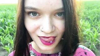 A sexual chick is working in the field and a man comes to help her