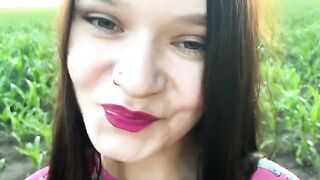 A sexual chick is working in the field and a man comes to help her