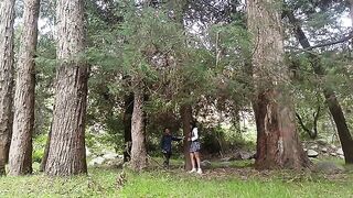 A hot girl has sex with a man in the forest, showcasing college uniform allure