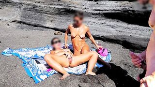 A girl stripped on the beach and masturbated publicly, while a guy pleasured himself
