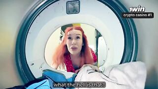 A washing machine broke, and a hot lady got stuck inside