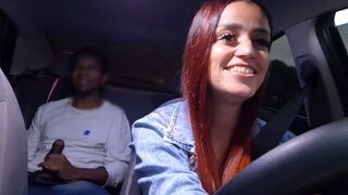 A hot chick is showing her body to the guy in the car