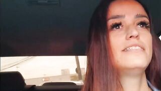 A hot chick is showing her body to the guy in the car