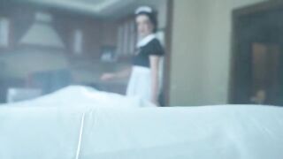 A ghost maid is fucking with a guy in a hotel room on Halloween